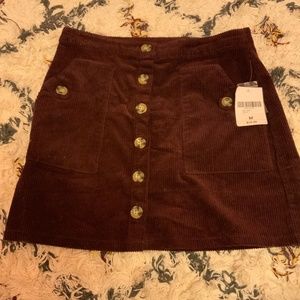 Burgundy button up corduroy skirt with pockets